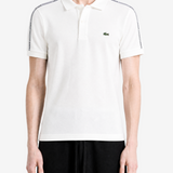 White shirt worn by a person, showing the shirt fit