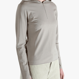 Grey knitwear worn by a person, showing the knitwear fit