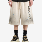 Tan shorts, full body view