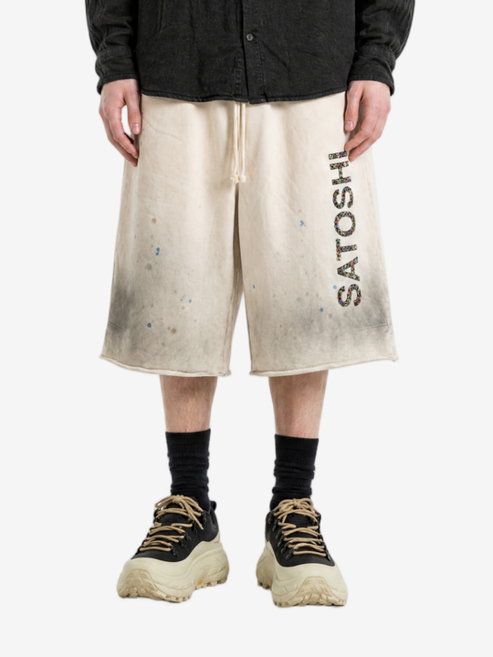 Tan shorts, full body view