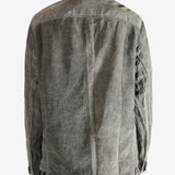 Grey jacket worn by a person, showing the jacket fit