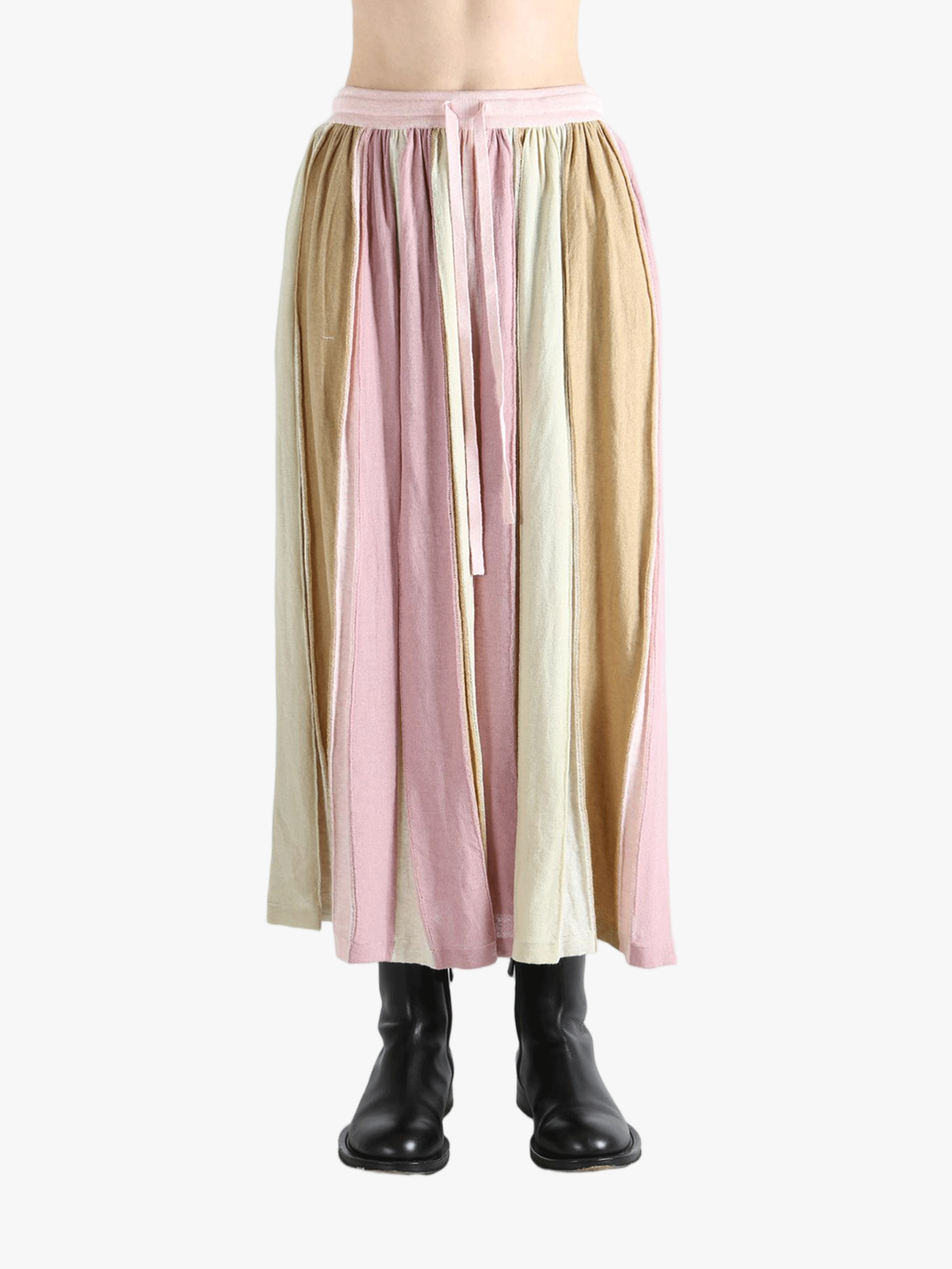 Pink skirt worn by a person, showing the skirt fit