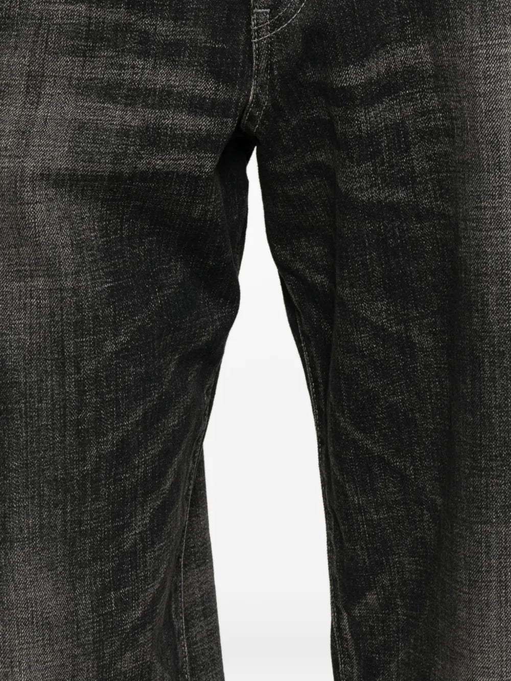 Close up of black pants, showing texture of the cotton fabric