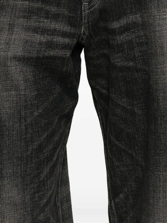 Close up of black pants, showing texture of the cotton fabric