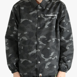 Black jacket worn by a person, showing the jacket's fit