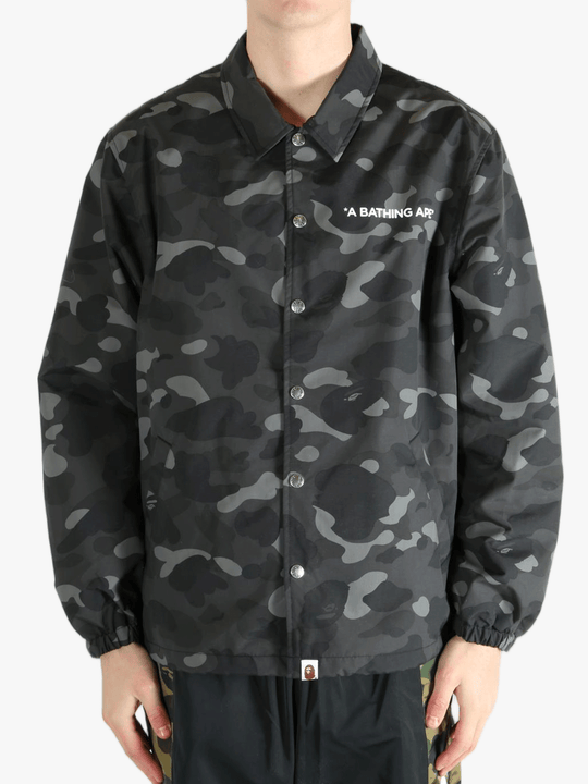Black jacket worn by a person, showing the jacket's fit