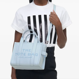 Blue bag worn by a person, showing the bag's fit