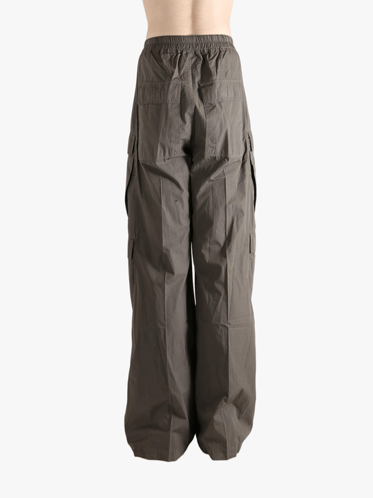 Grey pants worn by a person, showing the pants fit