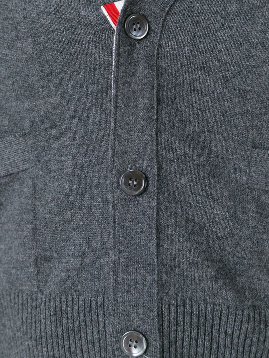 Close up of grey knitwear, showing texture of the cashmere fabric
