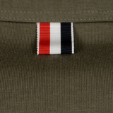 Close up of green t-shirt, showing texture of the Cotton fabric