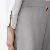 Close up of grey pants, showing texture of the cotton fabric