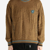 Brown jumper worn by a person, showing the jumper's fit
