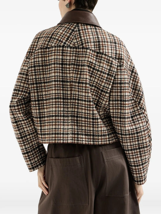 Brown jacket worn by a person, showing the jacket fit