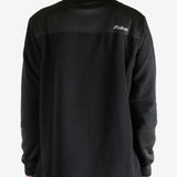 Black sweatshirt worn by a person, showing the sweatshirt's fit