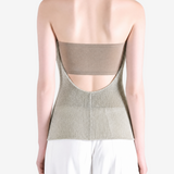 Green top worn by a person, showing the top fit