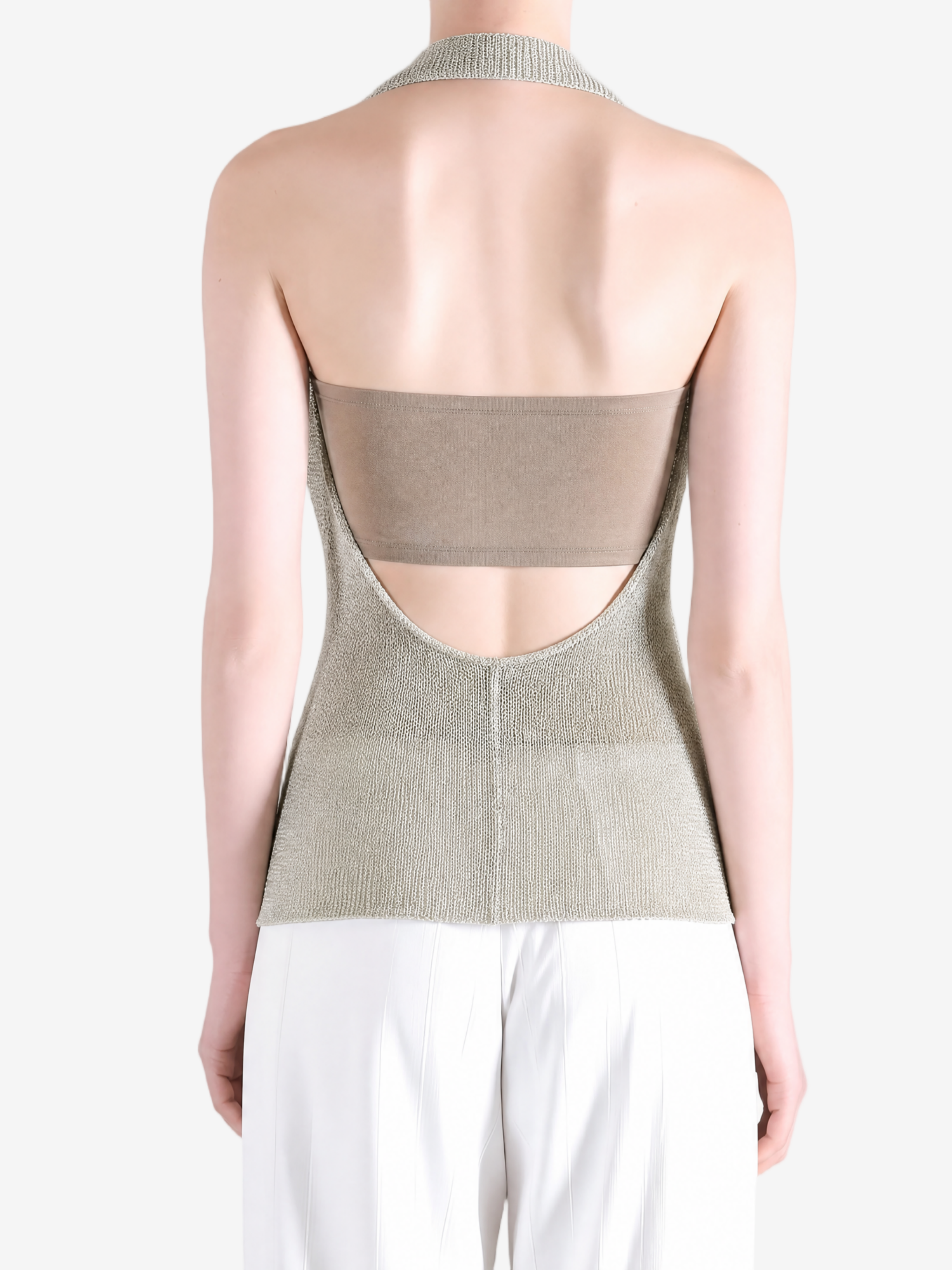 Green top worn by a person, showing the top fit