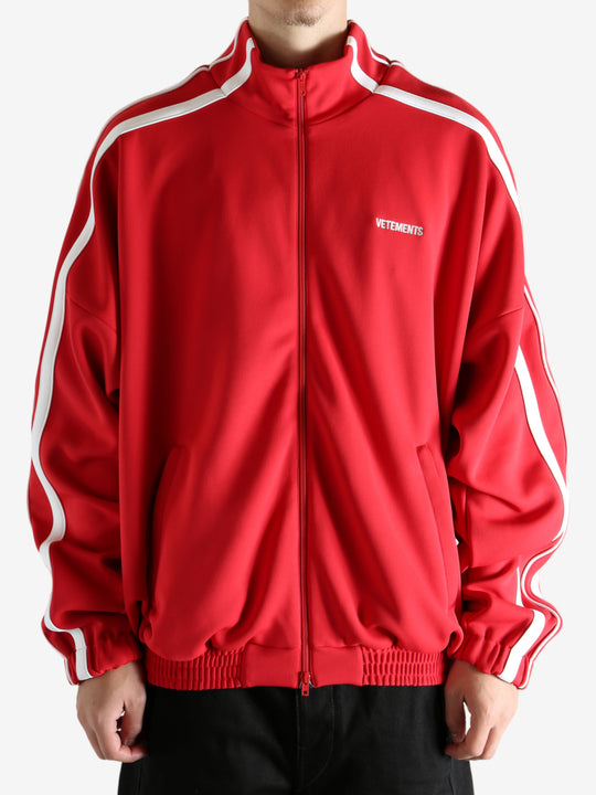 Red jacket worn by a person, showing the jacket's fit