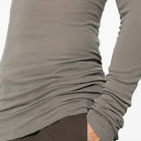 Grey t-shirt worn by a person, showing the t-shirt fit