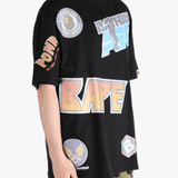 Black t-shirt worn by a person, showing the shirt's fit
