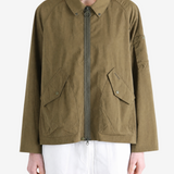 Brown jacket worn by a person, showing the jacket fit