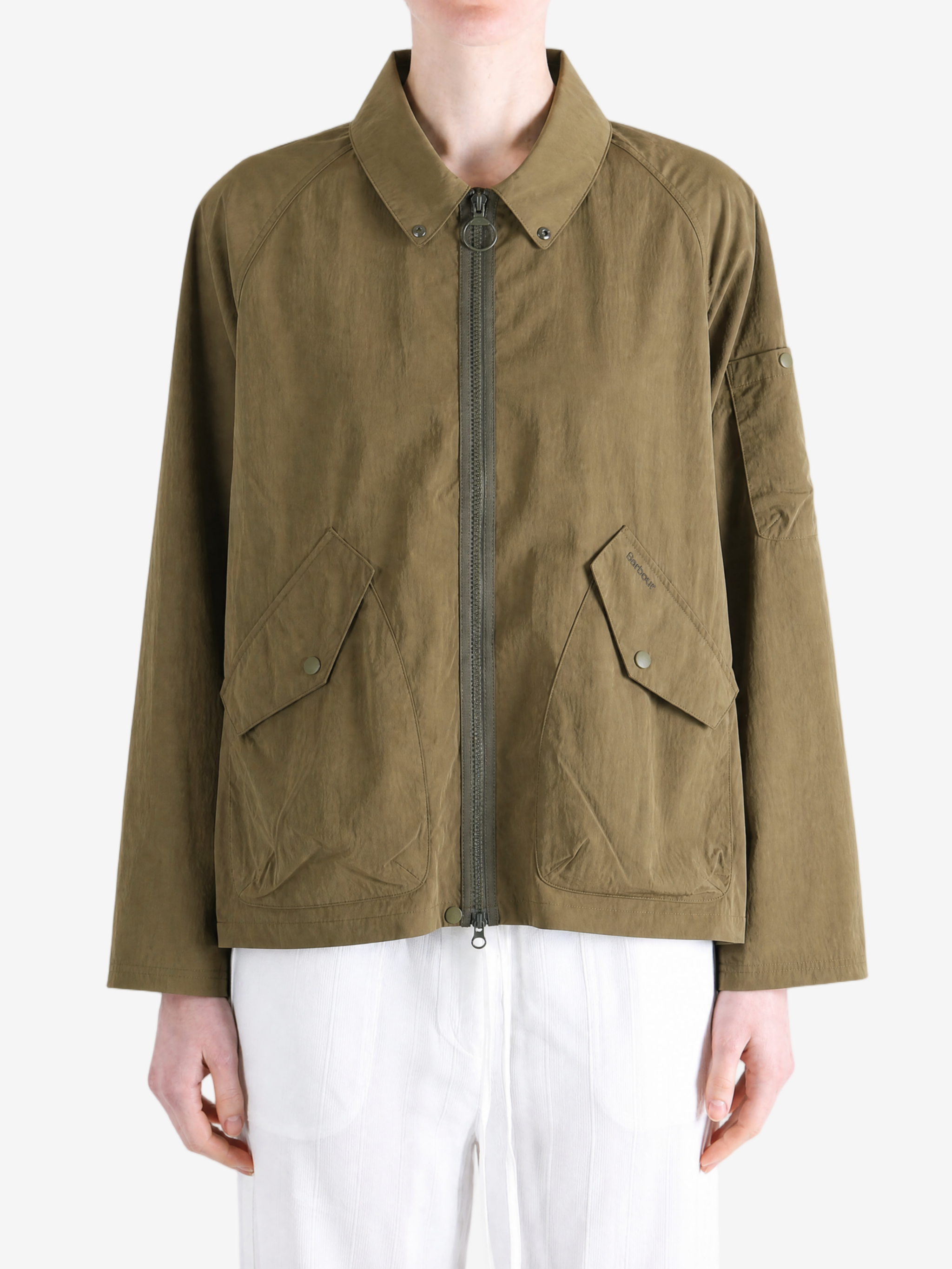 Brown jacket worn by a person, showing the jacket fit