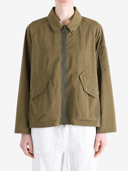 Brown jacket worn by a person, showing the jacket fit