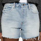 Close up of tan pants, showing texture of the Cotton fabric