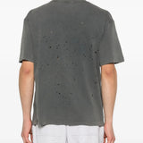 Black t-shirt worn by a person, showing the shirt's fit