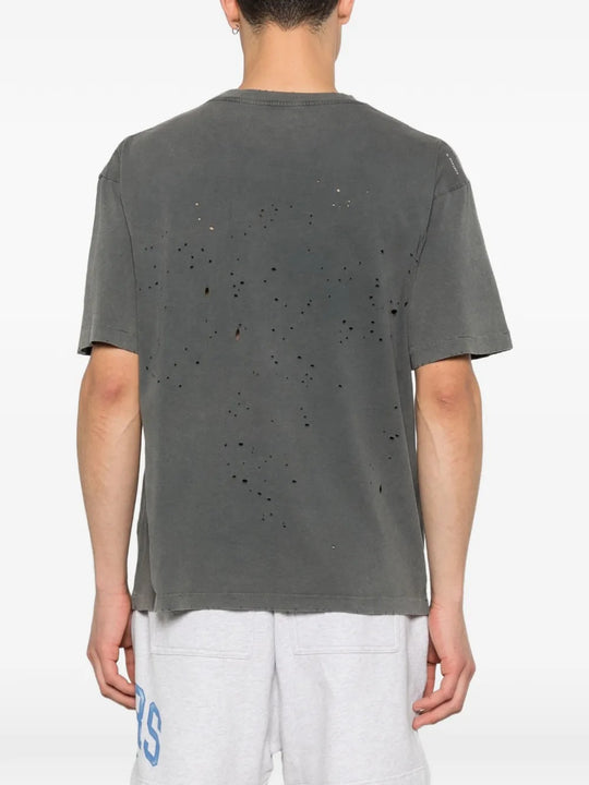 Black t-shirt worn by a person, showing the shirt's fit