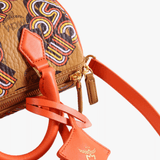 Close up of Orange bag, showing detail