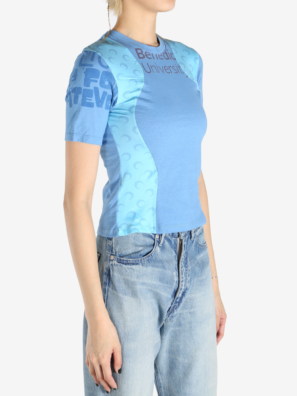 Blue t-shirts worn by a person, showing the t-shirts fit