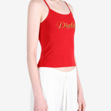 Red top worn by a person, showing the top fit