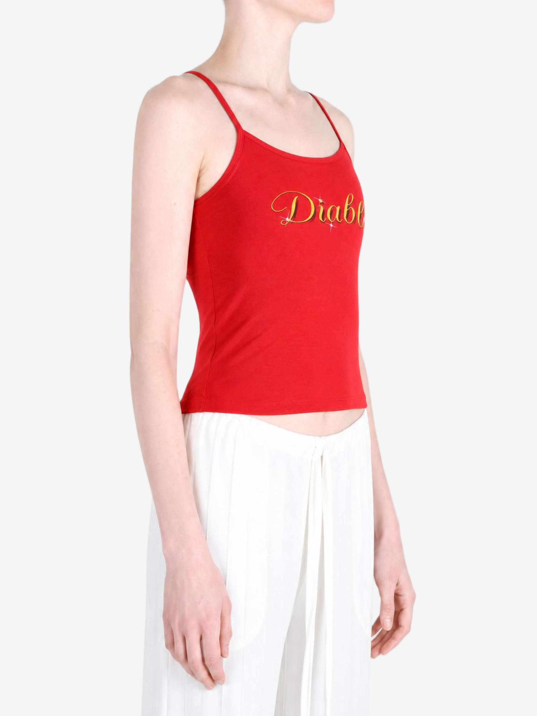 Red top worn by a person, showing the top fit