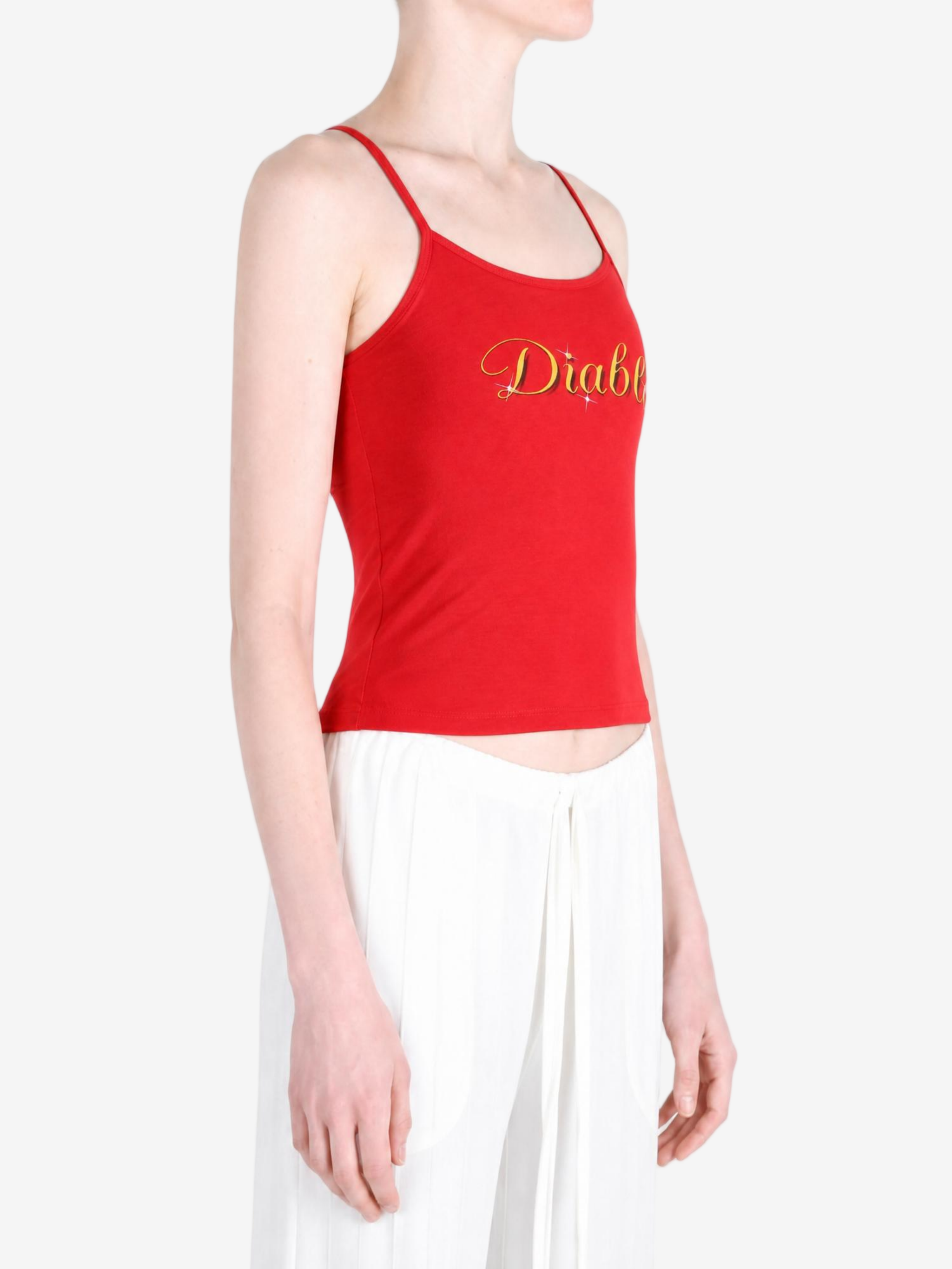 Red top worn by a person, showing the top fit