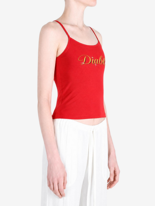 Red top worn by a person, showing the top fit