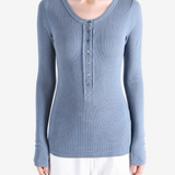 Blue shirt worn by a person, showing the shirt fit