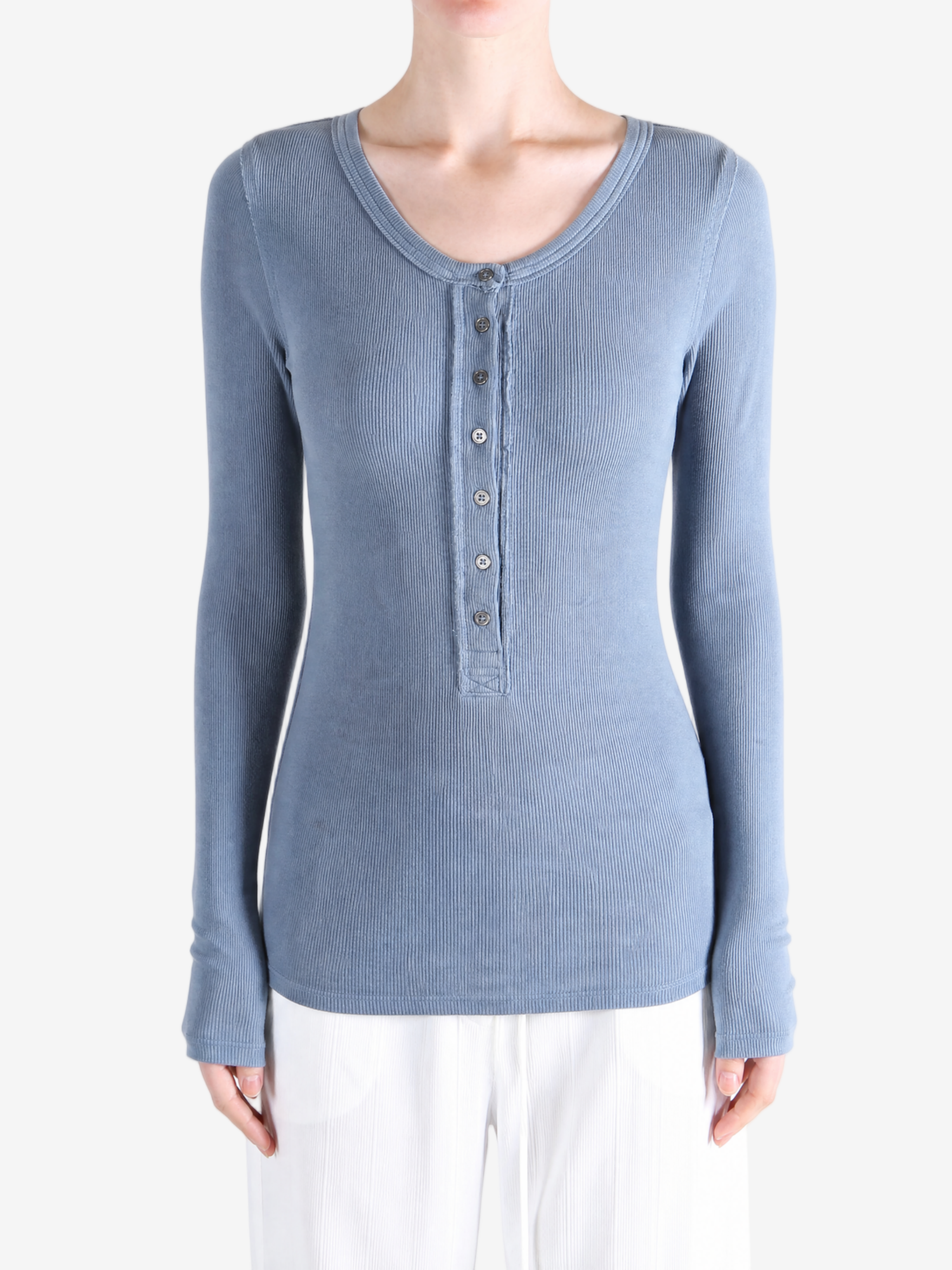 Blue shirt worn by a person, showing the shirt fit
