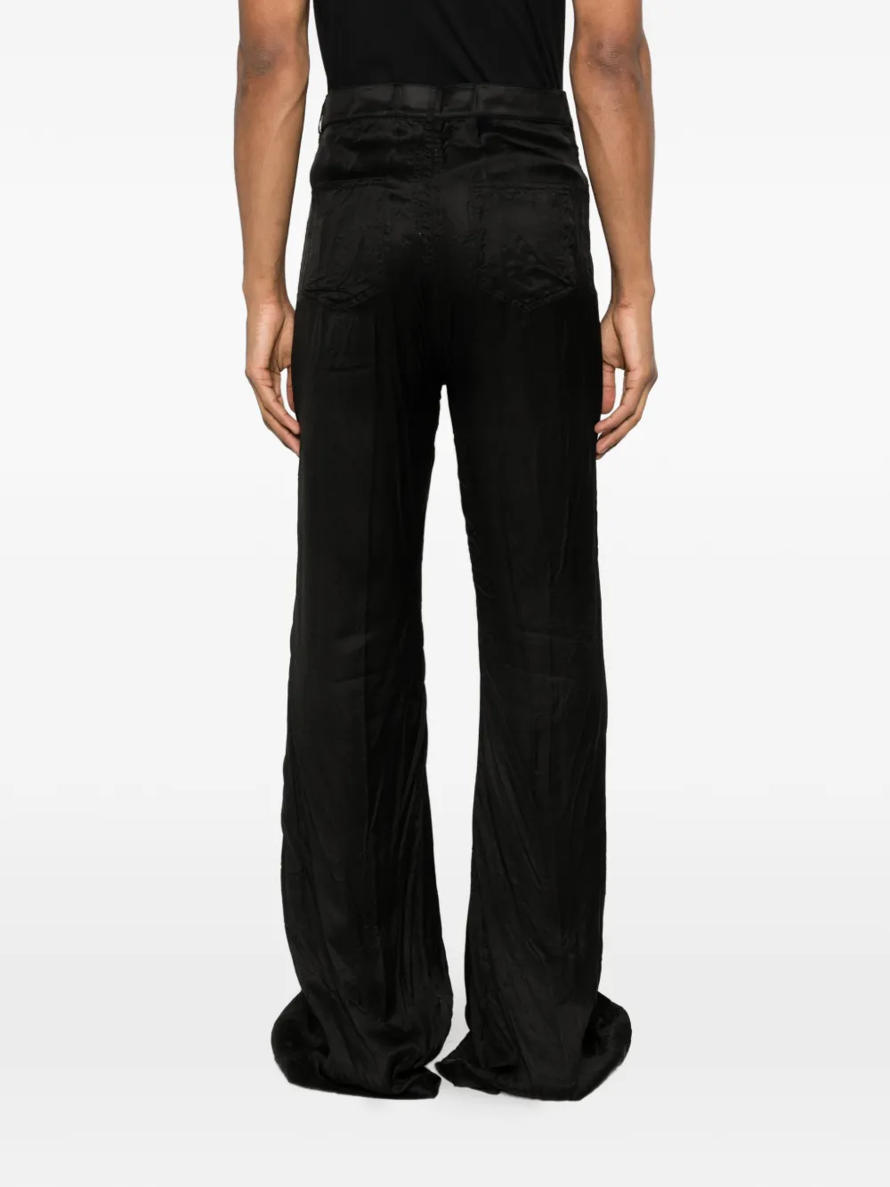 Black pant worn by a person, showing the pant fit