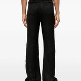 Black pant worn by a person, showing the pant fit