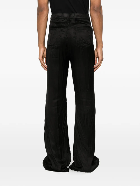 Black pant worn by a person, showing the pant fit