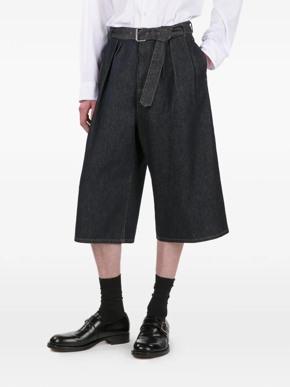 blue pants worn by a person, showing the pants fit