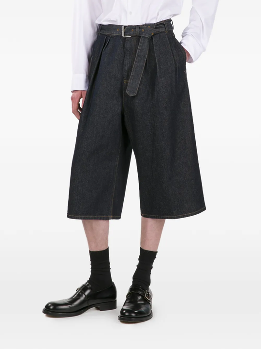 blue pants worn by a person, showing the pants fit