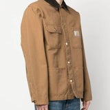 Tan coat worn by a person, showing the coat's fit