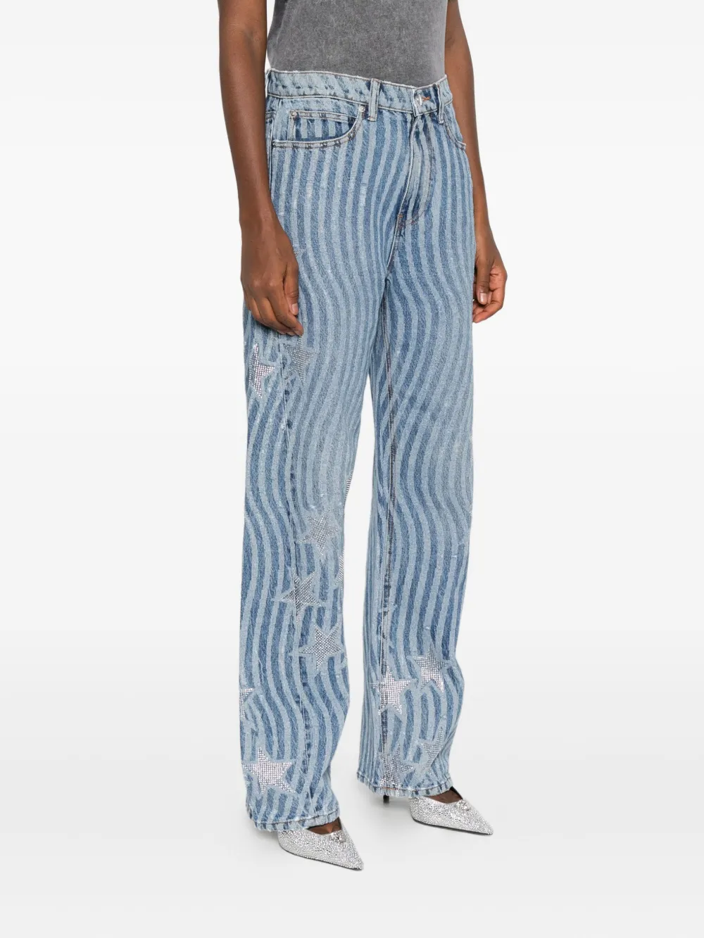 Blue pants worn by a person, showing the pants fit