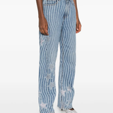 Blue pants worn by a person, showing the pants fit