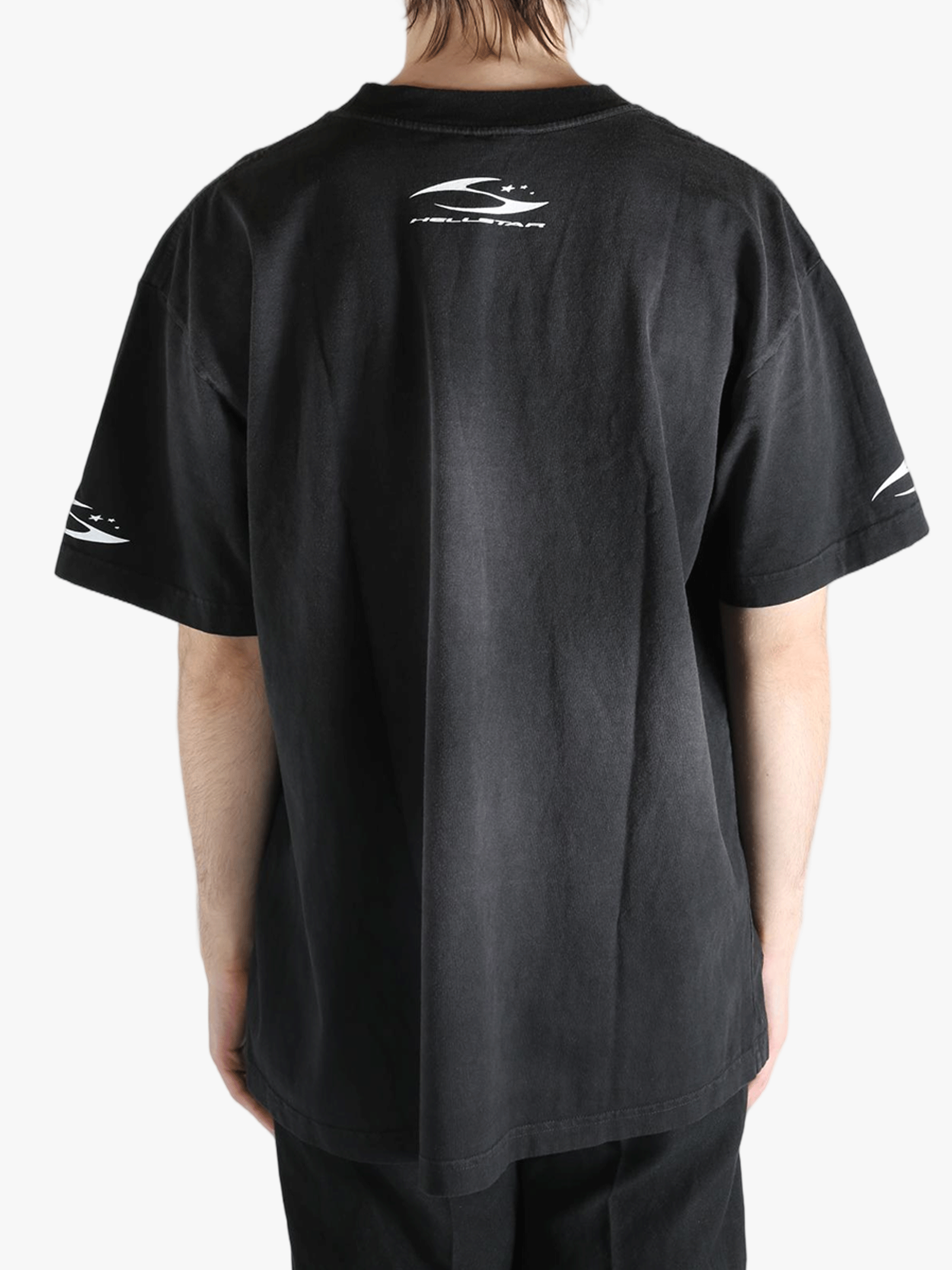 Black t-shirt worn by a person, showing the shirt's fit