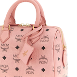 Close up of  pink bag,showing texture of the leather.