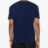 Blue shirt worn by a person, showing the shirt fit