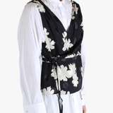 White shirt worn by a person, showing the shirt's fit