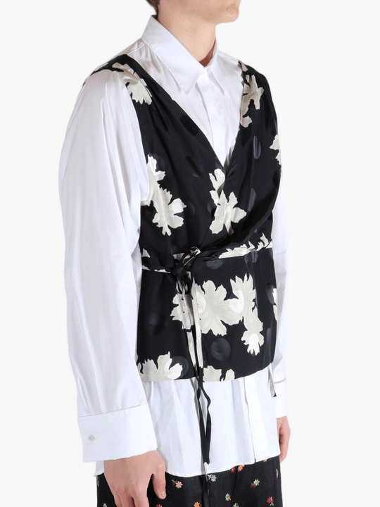 White shirt worn by a person, showing the shirt's fit